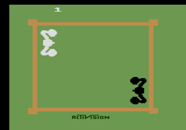 Activision's Boxing: the white and black boxers in the ring seen from above, with both scores and the clock at the top