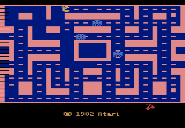 Ms. Pac-Man on the Atari 2600: a colourful maze with ghosts in different colours