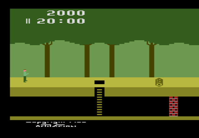 Pitfall Harry swinging on a vine over a tar pit in the jungle