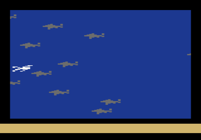 Swordquest: Waterworld: a room with the carrying pouch at the top of the screen and magical objects on the floor