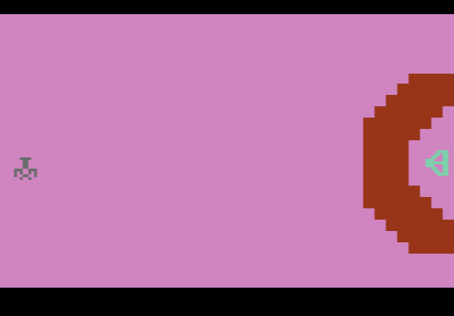 Yars' Revenge: the Yar on the left facing the Qotile's red shield on a pink screen